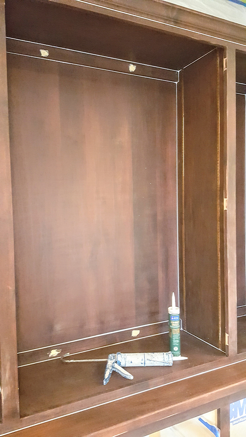 Caulking cabinets before painting