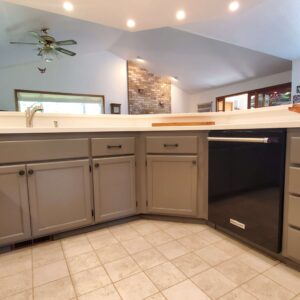 Eugene Painter for Kitchen Cabinets with new knobs and pulls
