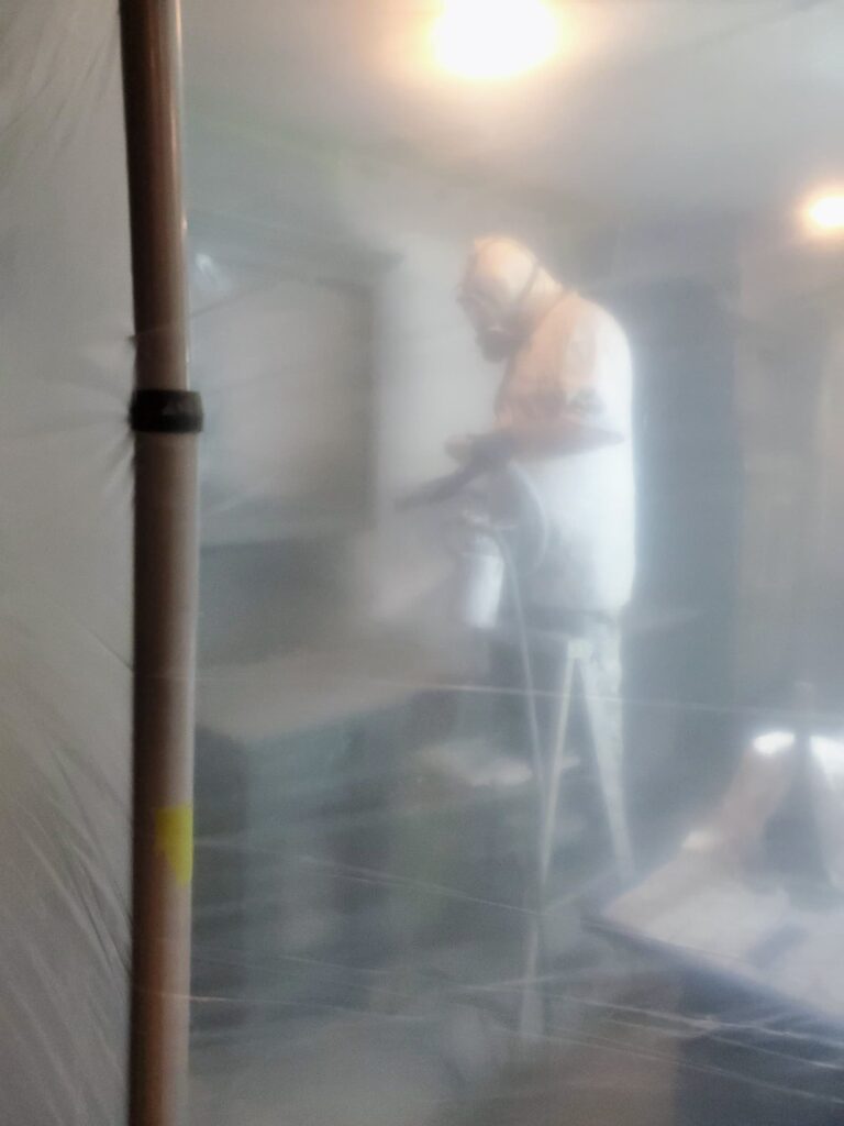 Painter for Eugene Kitchen Cabinets priming before painting