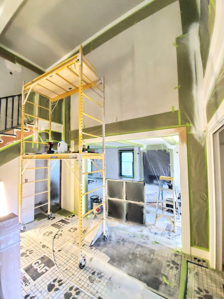 Eugene House Painter with Staircase prepared for protection