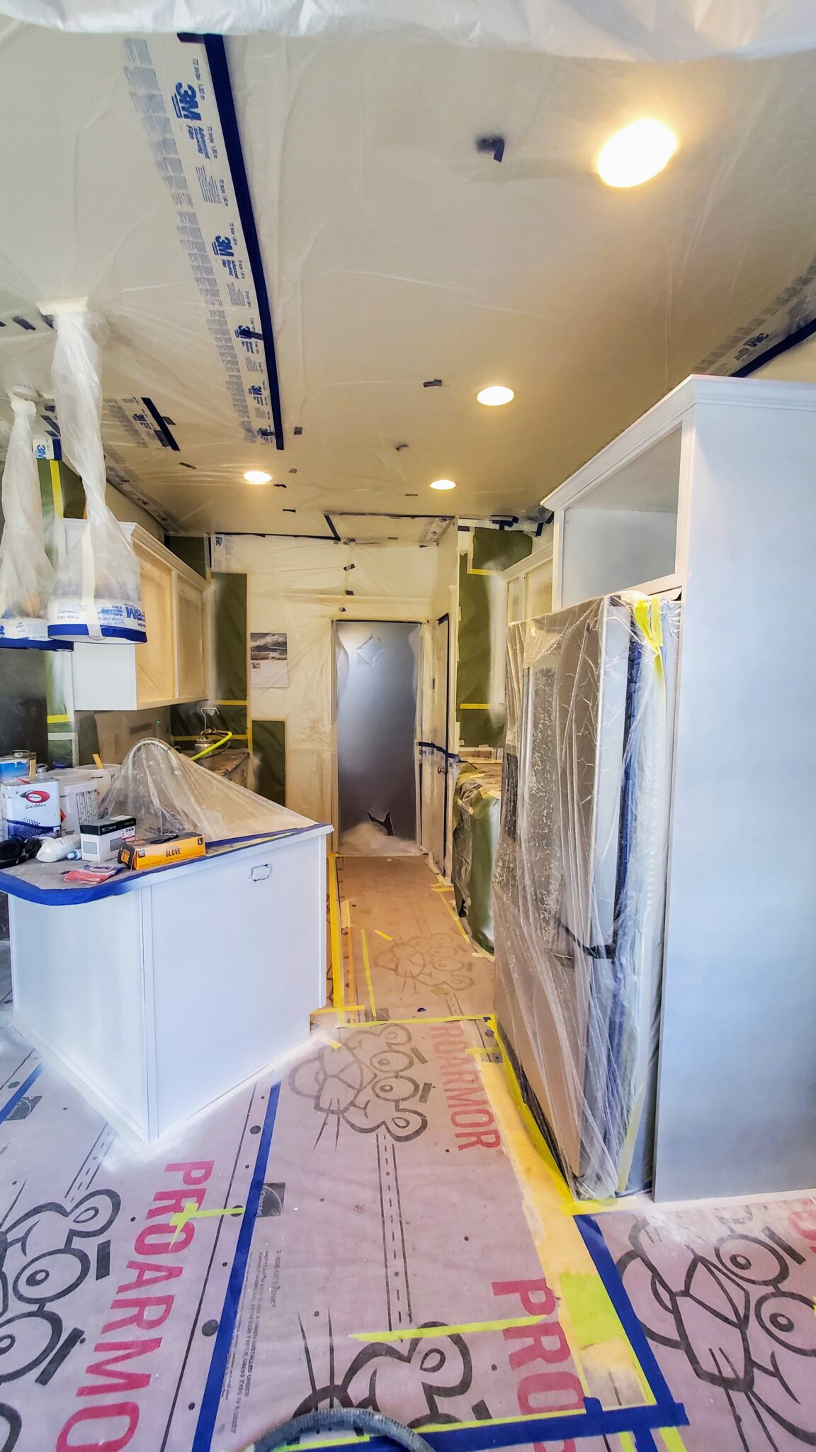 Multiple rounds of priming for Santa Clara Eugene Cabinet Painting